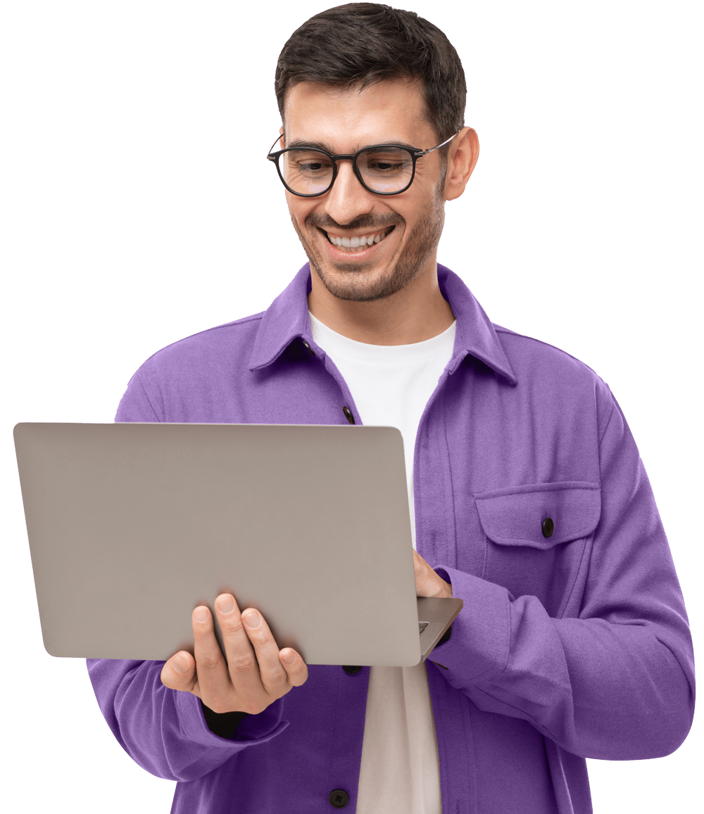 happy man standing with opened laptop browsing onl WJVQED8